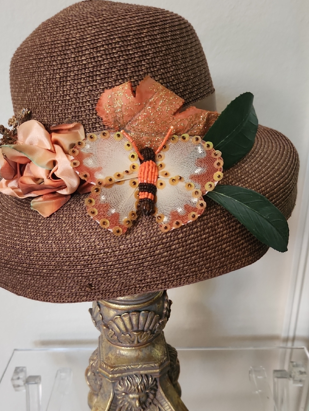 Women's Brown Straw Hat with Orange Butterfly Accent